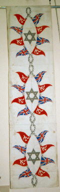 banner, Star of David, hammer and sickle, Union Jack on rope printed textile. [NMLH.1994.168.301] (image/jpeg)