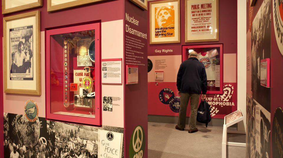 Image of visitor in the Citizens section of Main Gallery Two at People's History Museum.