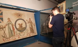 Filming the 1821 Tin Plate Workers Society banner in Main Gallery One © People's History Museum