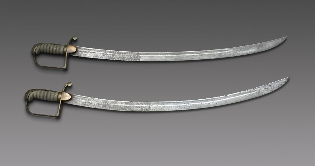 Two sabres of the Manchester and Salford Yeomanry's, used at Peterloo, 1819. Image courtesy of People's History Museum.