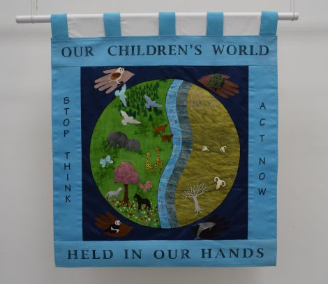 Our Children's World Held In Our Hands banner, 1996. Image courtesy of People's History Museum
