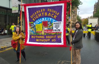 Image of Disabled People Fight Back banner by Ed Hall, Manchester, 2015 © Greater Manchester Coalition of Disabled People.
