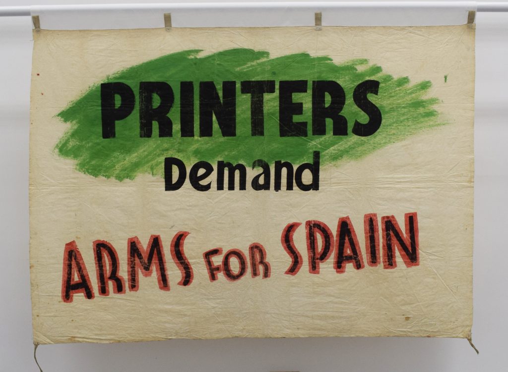 Printers Demand Arms for Spain banner, 1936. 2019 Banner Display @ People's History Museum