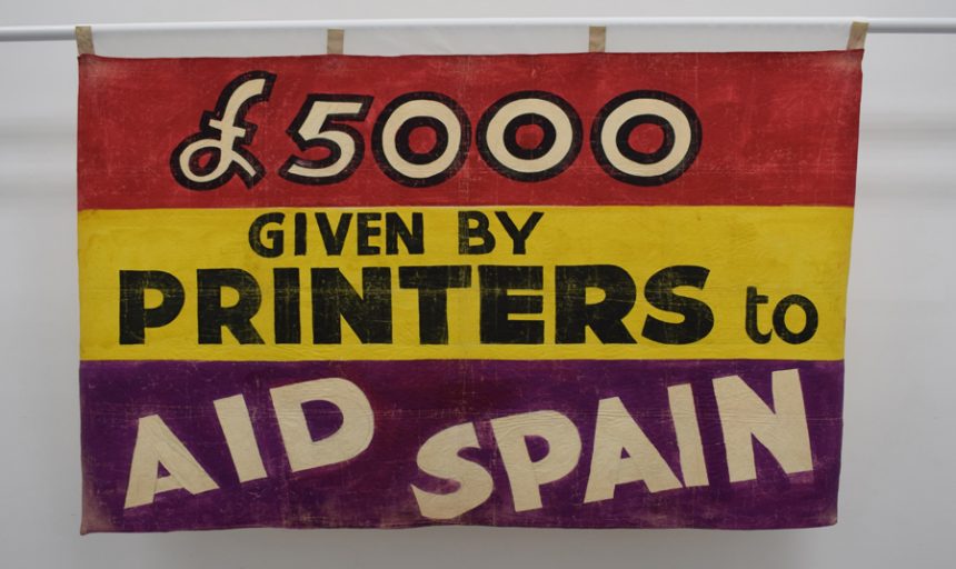 Image of Printers Aid Spain banner, around 1937. NMLH.1993.661
