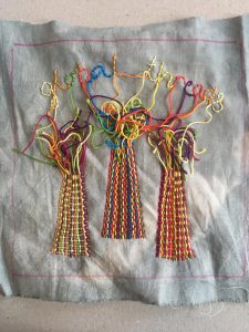 Textile piece using weaving techniques