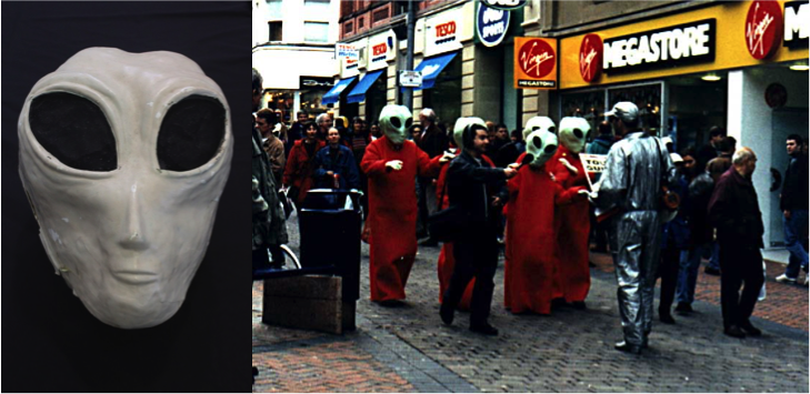 Left to right Alien Anthropologist mask & Alien Anthropologists walk through Manchester city centre. Photographs courtesy of www.polyp.org.uk
