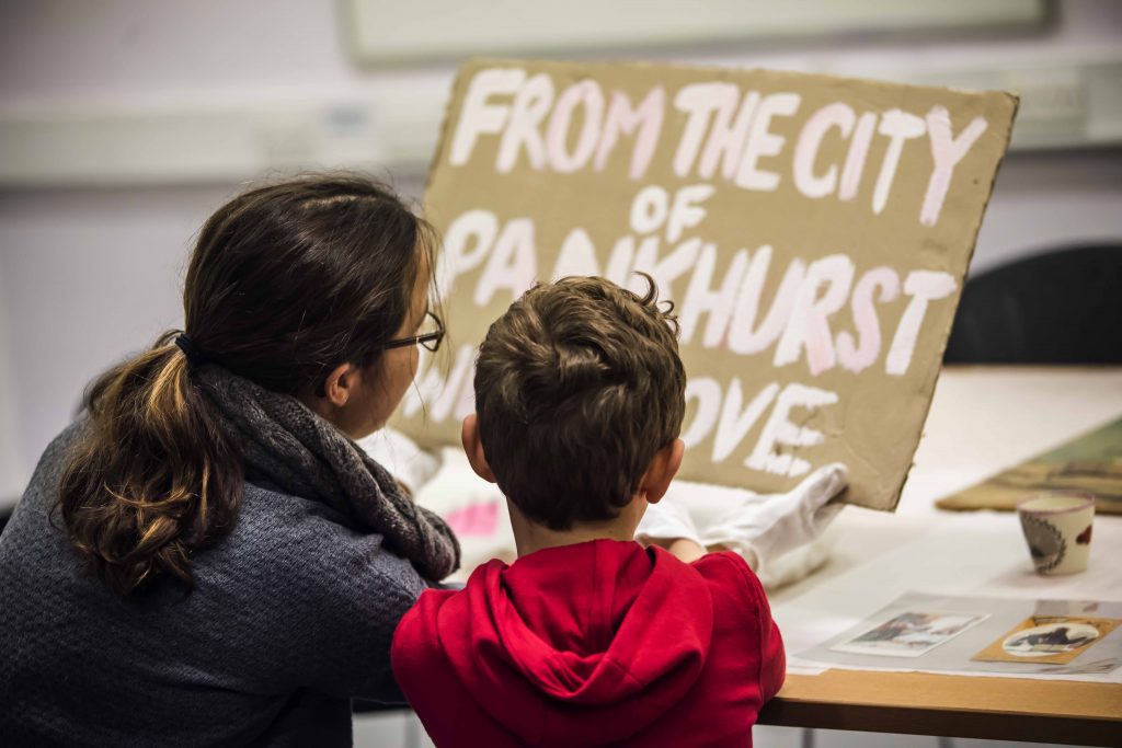 Visitors at People's History Museum object handling session