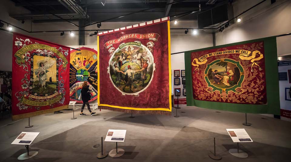 Image of 'The big three' banners display area in the Banners section of Gallery Two at People's History Museum.