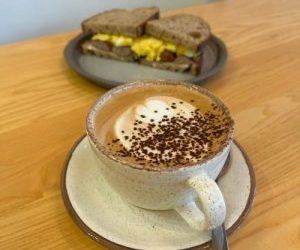 Breakfast butty and coffee at Open Kitchen Cafe & Bar.