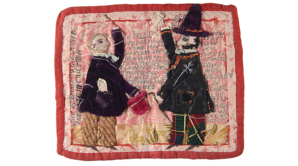Lorina Bulwer sampler, late 1800s. Image courtesy of Costume and Textile Collection, Norwich Castle Museum and Art Gallery (Norfolk Museums Service). Square textile with two people dressed in black jackets and with black hats raising their arms up towards each other, embroidered text surrounding them.