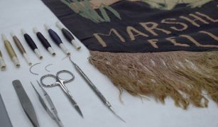 Image of Tools and threads for modern conservation dyeing in the Conservation Studio at People's History Museum