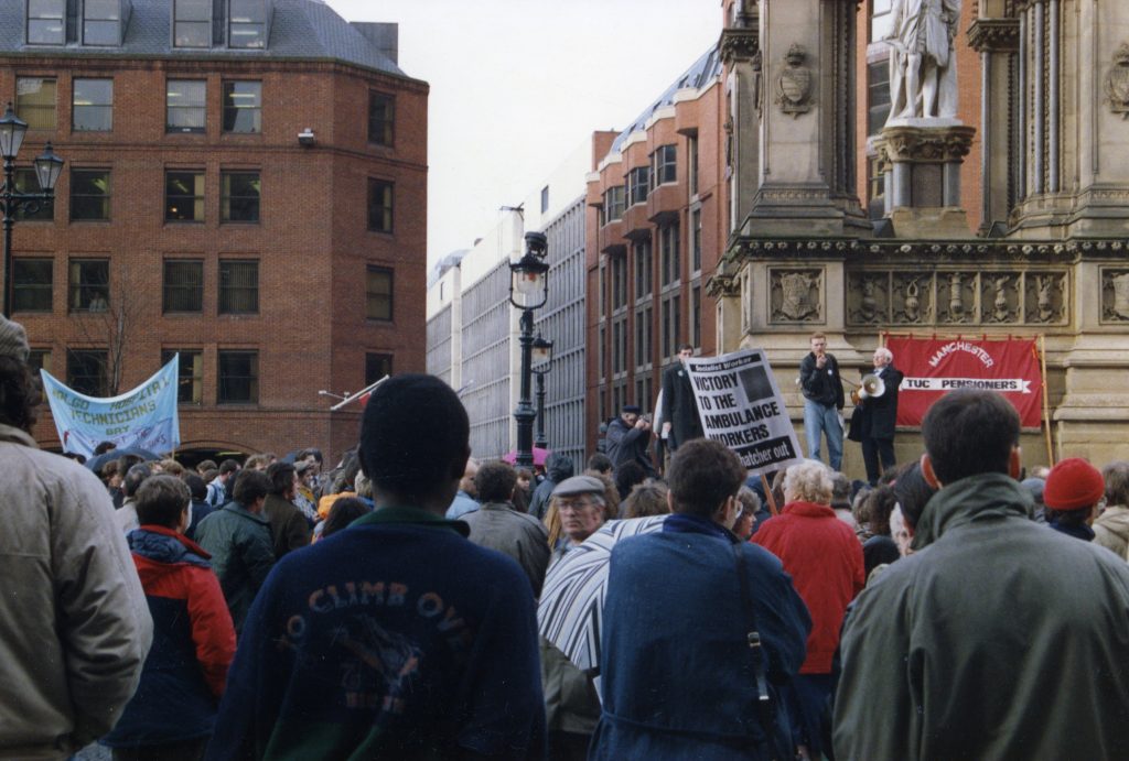 Photograph of ambulance workers dispute rally, Albert Square, Manchester. National Day of Action 30 January 1990. Image courtesy of People’s History Museum