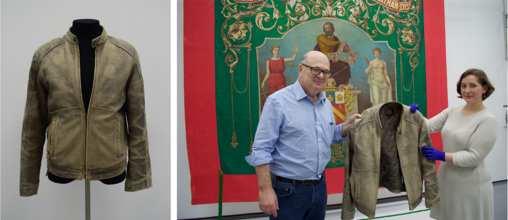 Left to right: leather jacket worn by campaigner Harry Leslie Smith, around 2013 and John Max Smith with Collections Manager Sam Jenkins with leather jacket in The Conservation Studio at PHM,
