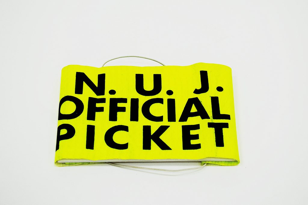 Image of National Union of Journalists Official Picket armband, around 1985. Image courtesy of People's History Museum.