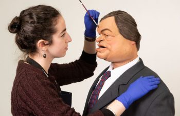 Image of PHM Conservator Kloe Rumsey with Spitting Image puppet of John Prescott, from around 1992. Image courtesy of People's History Museum.