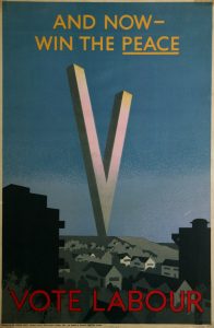 Poster with an illustration of a giant letter V standing on a hillside above houses, with the text: 'And Now – Win the Peace, Vote Labour'.