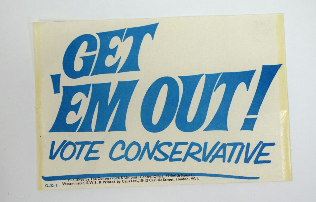 Landscape leaflet with blue text: 'Get 'Em Out! Vote Conservative'.