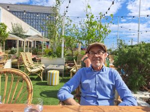 Colour photograph of a white man (Mike Jackson) smiling.