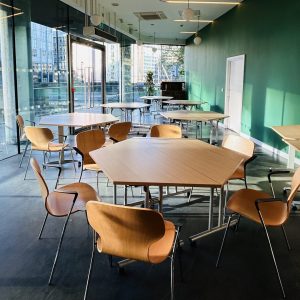 A room with tables and chairs