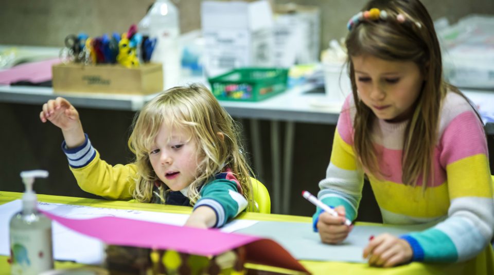 Image of Two children drawing