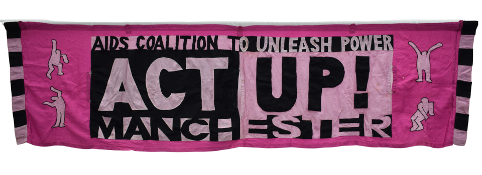 A pink and black banner with black text