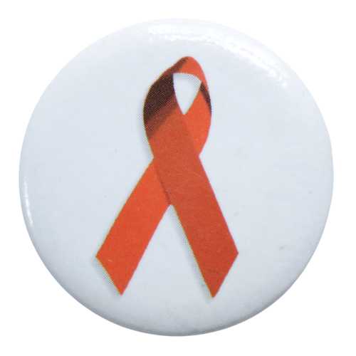 Image of A red ribbon on a white badge