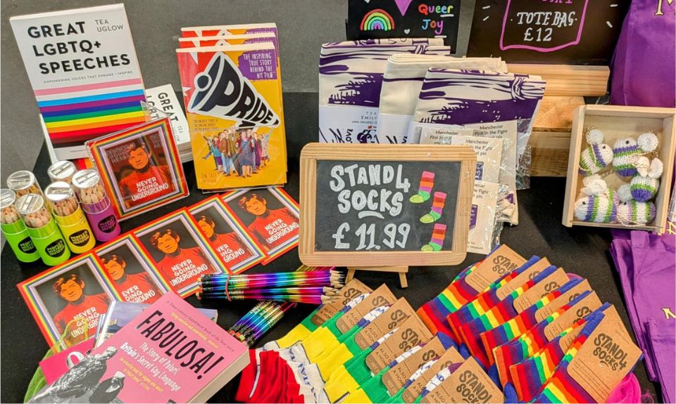 A table with colourful objects and books