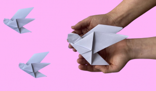 Image of Origami peace doves, a summer craft activity at People's History Museum (pink)
