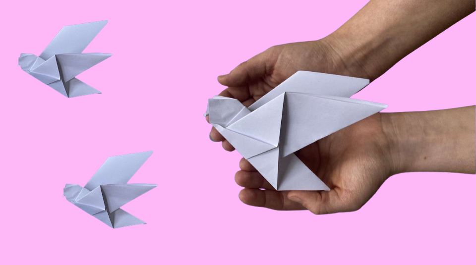 Image of Origami peace doves, a summer craft activity at People's History Museum (pink)