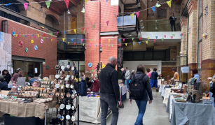 Image of People at an indoor market