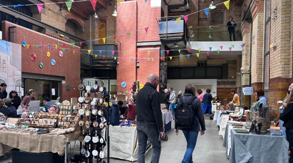Image of People at an indoor market