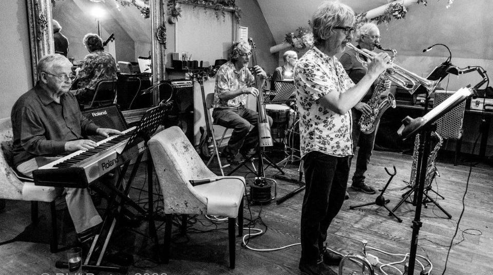 Image of Black and white photo of a 5 piece jazz band