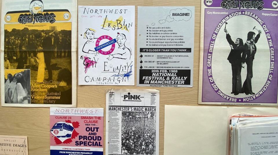 Image of A collection of flyers, leaflets and posters on a table.