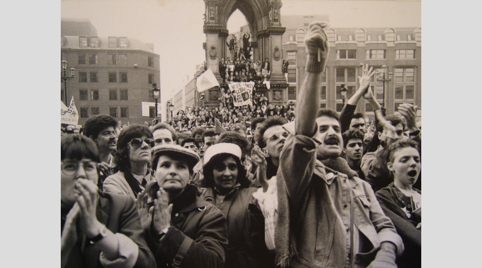 Image of A black and white photo of a crowd in Manchester Albert Square