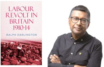 Image of Cover of a book, the text includes Labour Revolt In Britain 1910-14 by Ralph Darlington and studio portrait of a man wearing glasses and a black button-up shirt, standing with arms crossed against a light background.