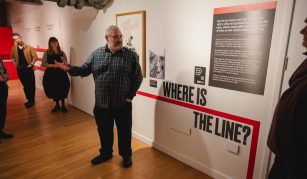 Image of A person leading a tour in a gallery