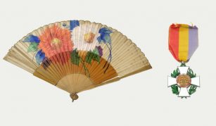 Image of Left to right: colour photograph of a traditional hand fan featuring a painted floral design with large red, white, and purple flowers and green leaves, and a photograph of a medal featuring a white cross with green laurel leaves behind, attached to a vertically striped ribbon in red, yellow, and purple.