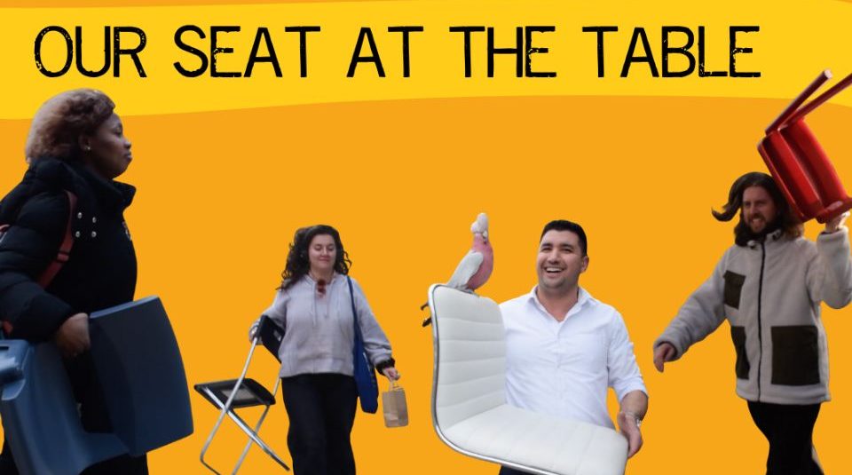 Image of Photograph of four people each carrying a different type of chair against a solid orange background with text 