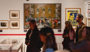 Image of Colour photograph of a group of people on a tour in a gallery.