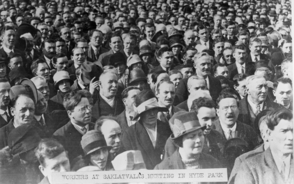 Photograph of crowd listening to Shapurji Saklatvala's speech in Hyde Park, London, 1 May 1926. Image courtesy of People's History Museum. Black and white photograph of a big crowd facing towards the same direction, with a label of text reading: 'Workers At Saklatvala's Meeting In Hyde Park'.