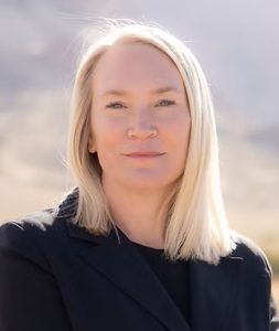 Colour headshot photograph of Pamela Say.